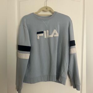 blue fila crewneck with white and blue stripes